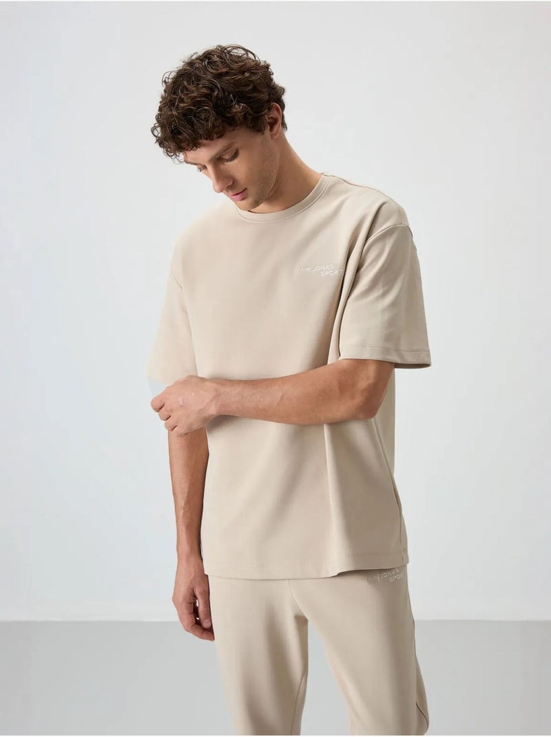 Ensemble de sport homme oversize en coton mélangé tommy Beige argile - Kiabi