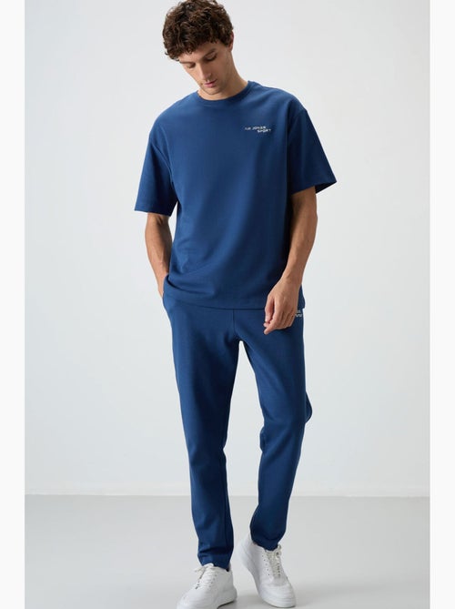 Ensemble de sport homme oversize en coton mélangé tommy - Kiabi Ensemble de sport homme oversize en coton mélangé tommy - Kiabi