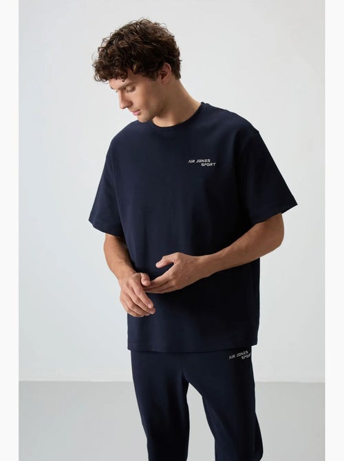 Ensemble de sport homme oversize en coton mélangé tommy - Kiabi Ensemble de sport homme oversize en coton mélangé tommy - Kiabi
