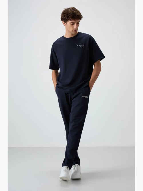 Ensemble de sport homme oversize en coton mélangé tommy - Kiabi Ensemble de sport homme oversize en coton mélangé tommy - Kiabi