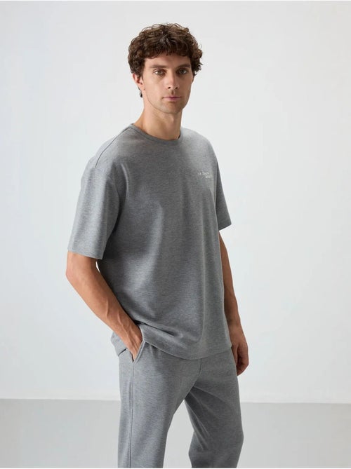 Ensemble de sport homme oversize en coton mélangé tommy - Kiabi Ensemble de sport homme oversize en coton mélangé tommy - Kiabi