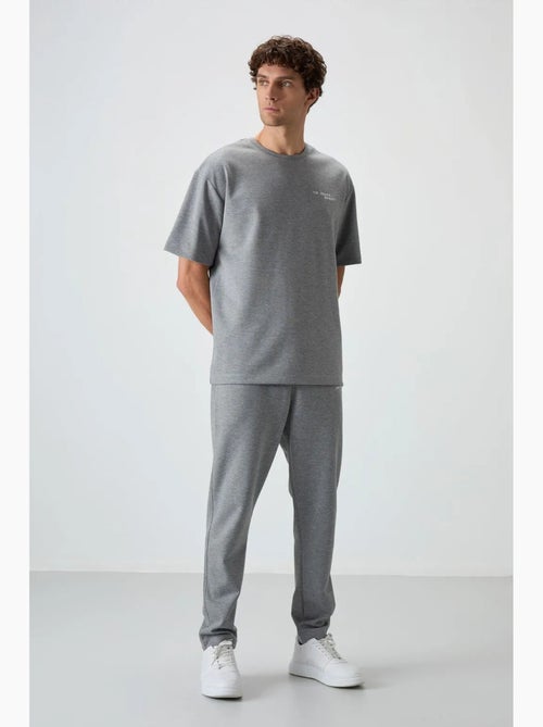 Ensemble de sport homme oversize en coton mélangé tommy - Kiabi Ensemble de sport homme oversize en coton mélangé tommy - Kiabi