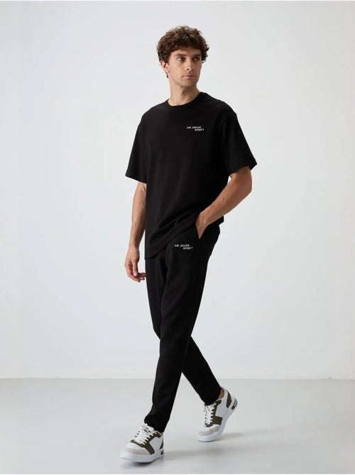Ensemble de sport homme oversize en coton mélangé tommy - Kiabi Ensemble de sport homme oversize en coton mélangé tommy - Kiabi