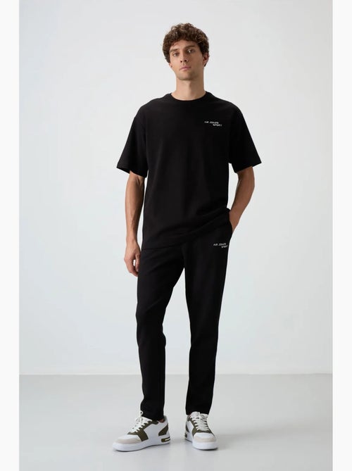 Ensemble de sport homme oversize en coton mélangé tommy - Kiabi Ensemble de sport homme oversize en coton mélangé tommy - Kiabi