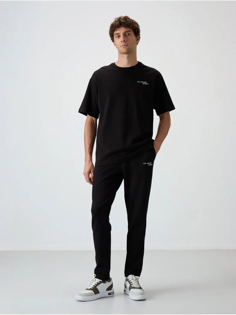 Ensemble de sport homme oversize en coton mélangé tommy Noir - Kiabi