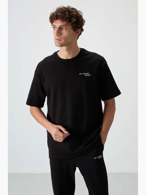 Ensemble de sport homme oversize en coton mélangé tommy - Kiabi Ensemble de sport homme oversize en coton mélangé tommy - Kiabi