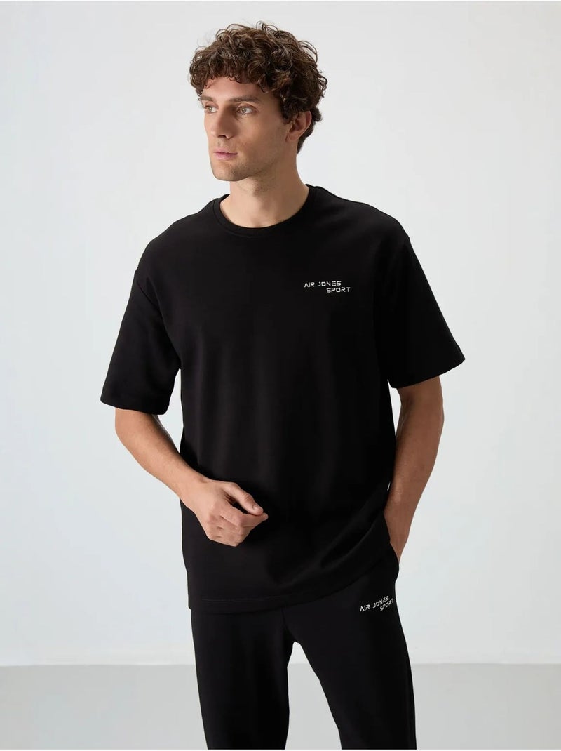 Ensemble de sport homme oversize en coton mélangé tommy Noir - Kiabi