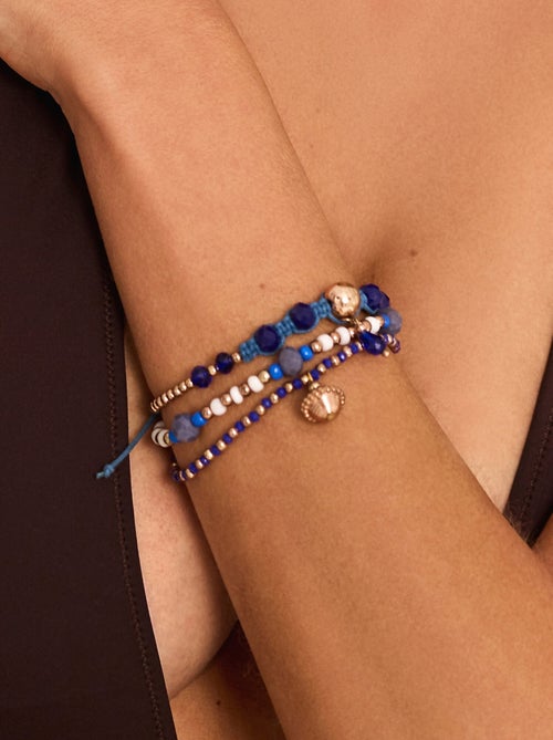 Ensemble de trois bracelets bleu et doré complementos - Kiabi Ensemble de trois bracelets bleu et doré complementos - Kiabi