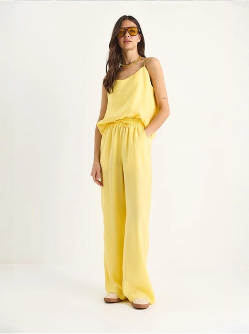 Ensemble débardeur sans manches et pantalon large lucci - Kiabi Ensemble débardeur sans manches et pantalon large lucci - Kiabi