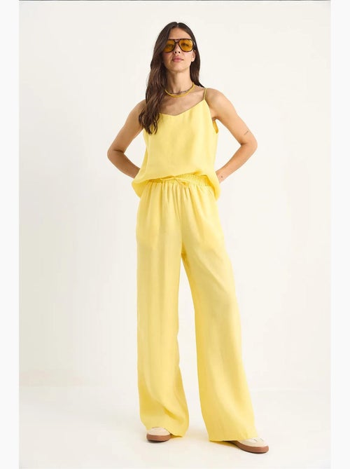 Ensemble débardeur sans manches et pantalon large lucci - Kiabi Ensemble débardeur sans manches et pantalon large lucci - Kiabi