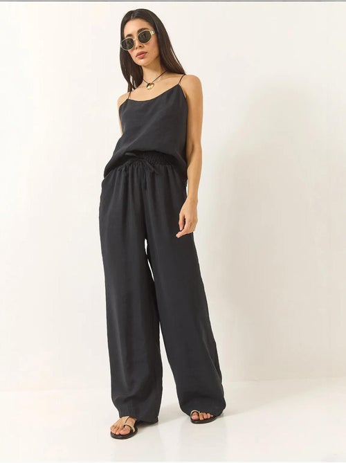 Ensemble débardeur sans manches et pantalon large lucci - Kiabi Ensemble débardeur sans manches et pantalon large lucci - Kiabi