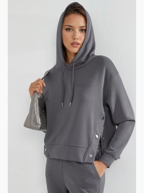 Ensemble deux pièces à capuche, taille haute et jambes larges hiccup - Kiabi Ensemble deux pièces à capuche, taille haute et jambes larges hiccup - Kiabi