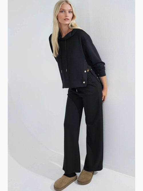 Ensemble deux pièces à capuche, taille haute et jambes larges hiccup - Kiabi Ensemble deux pièces à capuche, taille haute et jambes larges hiccup - Kiabi