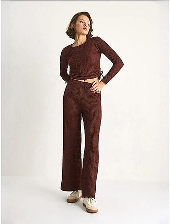 Ensemble deux pièces ajusté avec pantalon évasé lucci