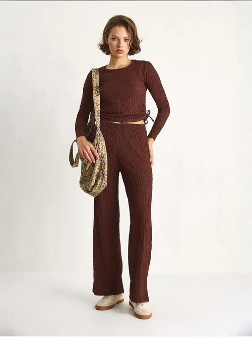 Ensemble deux pièces ajusté avec pantalon évasé lucci - Kiabi Ensemble deux pièces ajusté avec pantalon évasé lucci - Kiabi