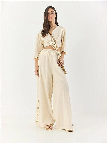 Ensemble deux pièces avec chemisier à nouer, ourlet boutonné doublé et pantalon doublé lucci