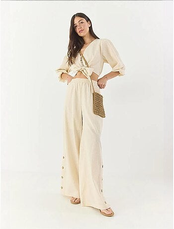 Ensemble deux pièces avec chemisier à nouer, ourlet boutonné doublé et pantalon doublé lucci