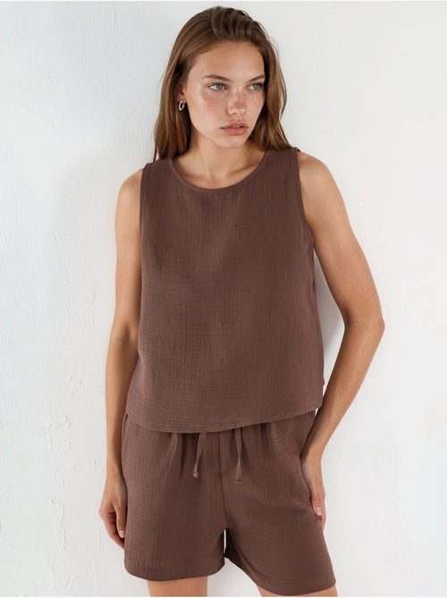 Ensemble deux pièces avec top en mousseline sans manches et short - Kiabi Ensemble deux pièces avec top en mousseline sans manches et short - Kiabi