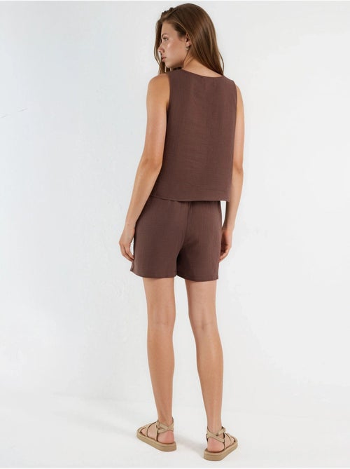 Ensemble deux pièces avec top en mousseline sans manches et short - Kiabi Ensemble deux pièces avec top en mousseline sans manches et short - Kiabi