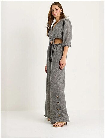 Ensemble deux pièces bianco avec chemisier à nouer, ourlet boutonné doublé et pantalon doublé lucci
