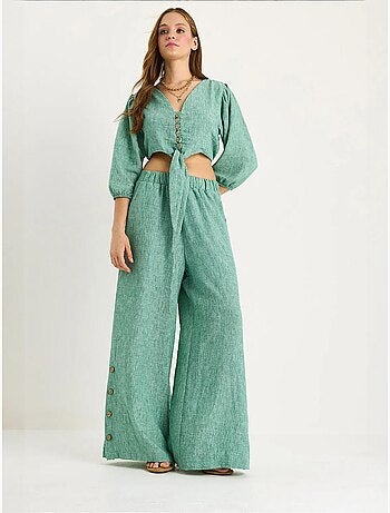 Ensemble deux pièces bianco avec chemisier à nouer, ourlet boutonné doublé et pantalon doublé lucci