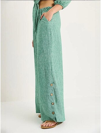 Ensemble deux pièces bianco avec chemisier à nouer, ourlet boutonné doublé et pantalon doublé lucci