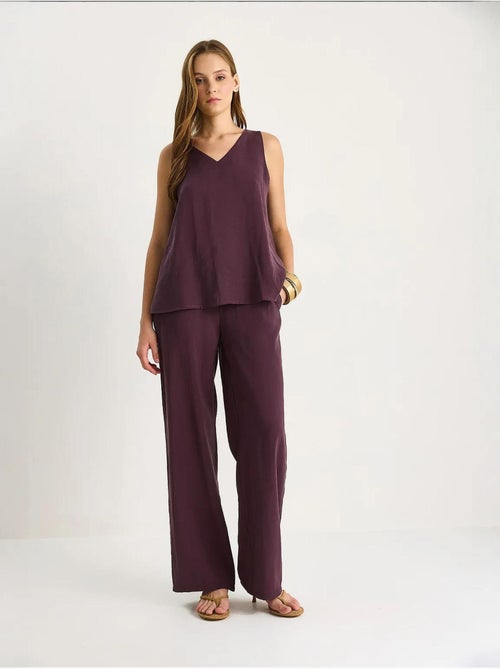 Ensemble deux pièces : chemisier à bretelles et col en v, pantalon palazzo lucci - Kiabi Ensemble deux pièces : chemisier à bretelles et col en v, pantalon palazzo lucci - Kiabi