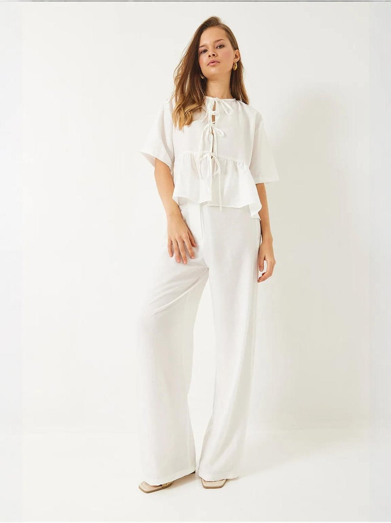 Ensemble deux pièces chemisier et pantalon à manches courtes avec détails noués de bianco lucci Blanc - Kiabi