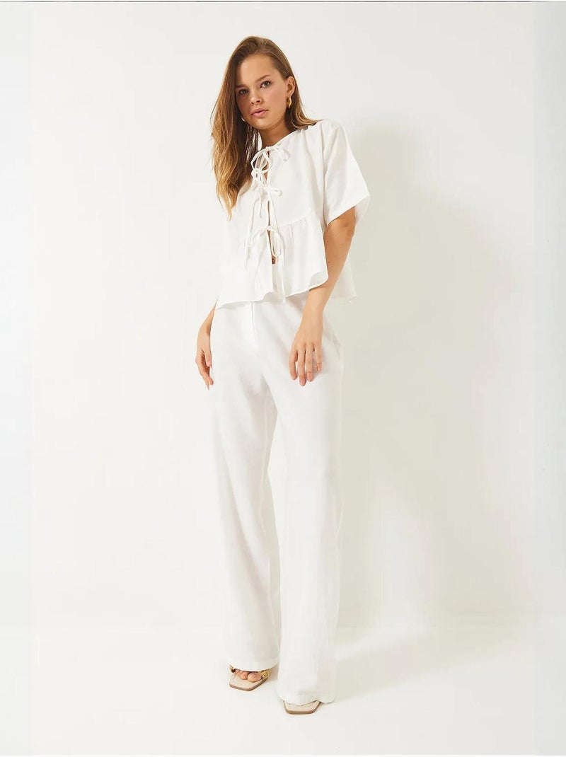 Ensemble deux pièces chemisier et pantalon à manches courtes avec détails noués de bianco lucci Blanc - Kiabi
