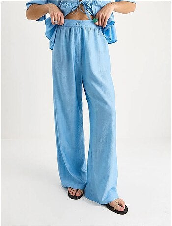 Ensemble deux pièces chemisier et pantalon à manches courtes avec détails noués de bianco lucci