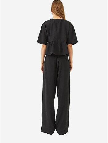 Ensemble deux pièces chemisier et pantalon à manches courtes avec détails noués de bianco lucci
