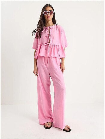 Ensemble deux pièces chemisier et pantalon à manches courtes avec détails noués de bianco lucci