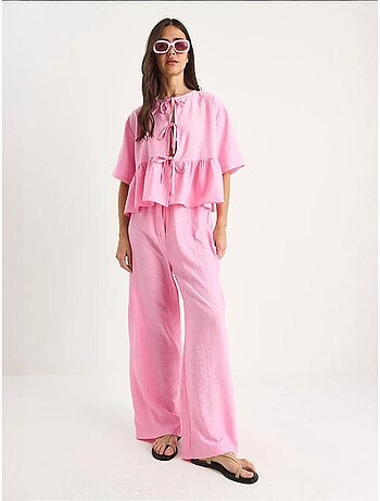 Ensemble deux pièces chemisier et pantalon à manches courtes avec détails noués de bianco lucci