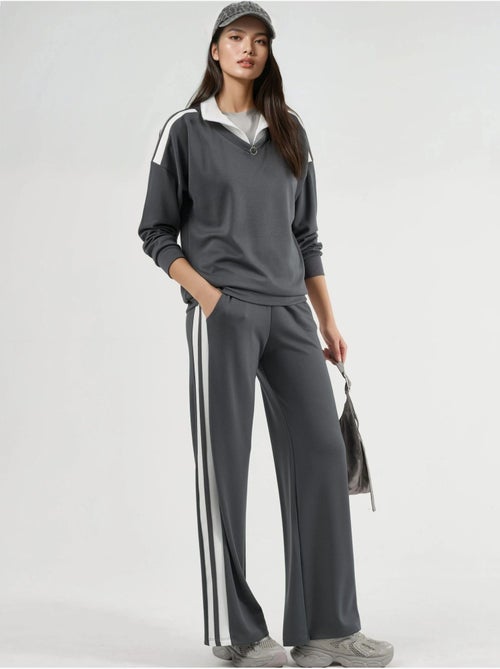 Ensemble deux pièces coordonné à col zippé et jambes larges hiccup - Kiabi Ensemble deux pièces coordonné à col zippé et jambes larges hiccup - Kiabi