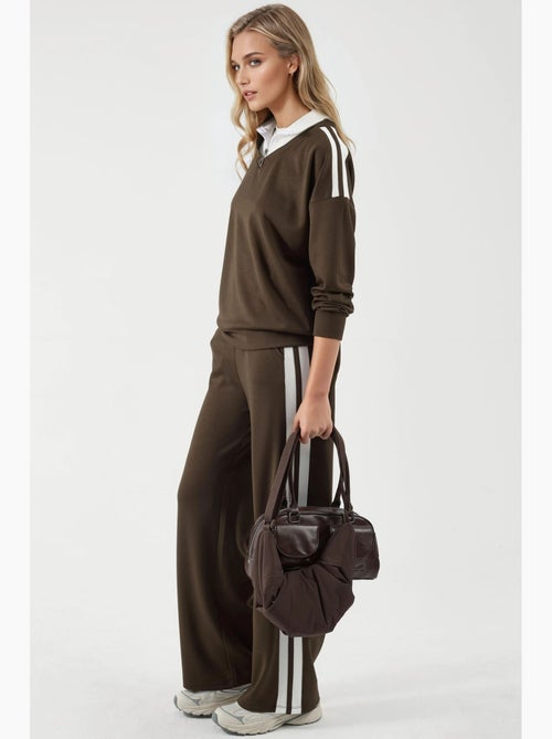 Ensemble deux pièces coordonné à col zippé et jambes larges hiccup - Kiabi Ensemble deux pièces coordonné à col zippé et jambes larges hiccup - Kiabi