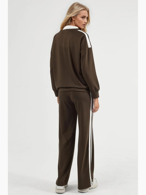 Ensemble deux pièces coordonné à col zippé et jambes larges hiccup - Kiabi Ensemble deux pièces coordonné à col zippé et jambes larges hiccup - Kiabi