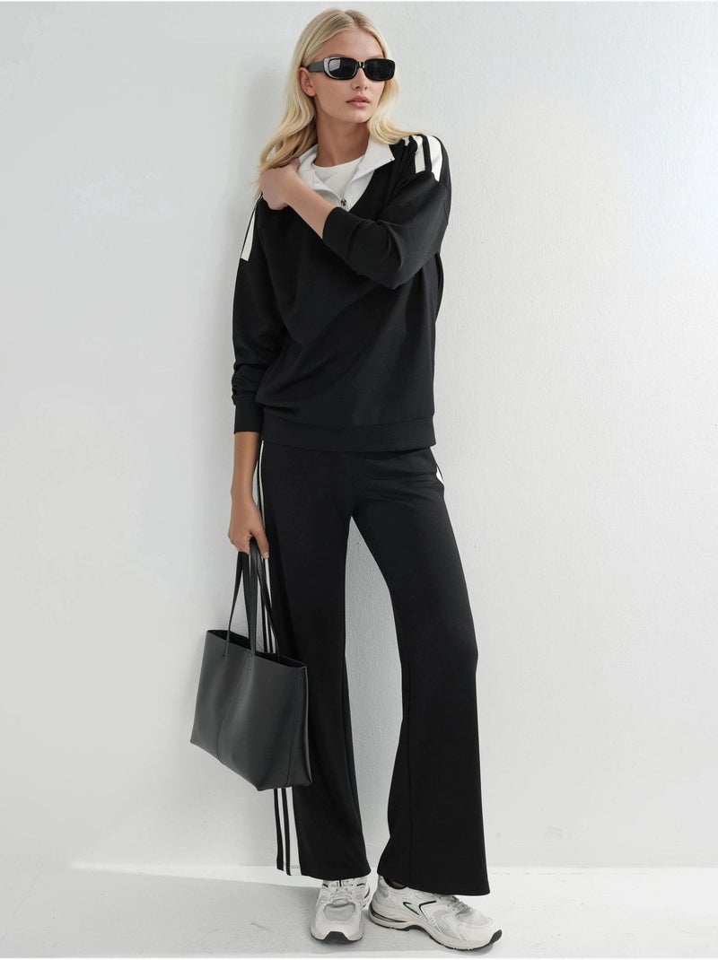 Ensemble deux pièces coordonné à col zippé et jambes larges Noir - Kiabi