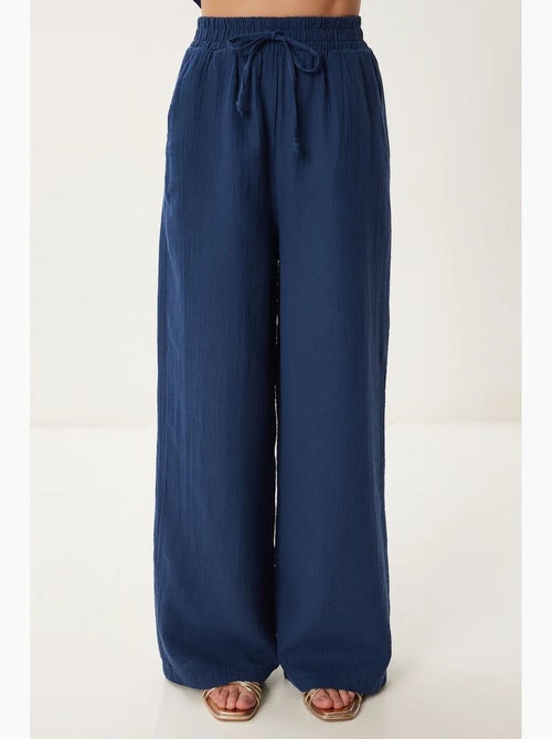 Ensemble deux pièces coordonné à taille haute, jambe large et col chemise istanbul - Kiabi Ensemble deux pièces coordonné à taille haute, jambe large et col chemise istanbul - Kiabi