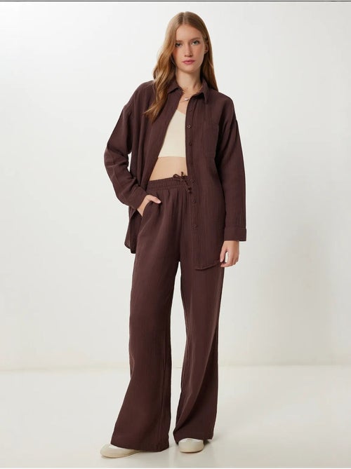 Ensemble deux pièces coordonné à taille haute, jambe large et col chemise istanbul - Kiabi Ensemble deux pièces coordonné à taille haute, jambe large et col chemise istanbul - Kiabi