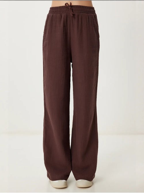 Ensemble deux pièces coordonné à taille haute, jambe large et col chemise istanbul - Kiabi Ensemble deux pièces coordonné à taille haute, jambe large et col chemise istanbul - Kiabi