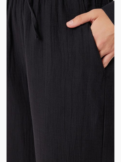 Ensemble deux pièces coordonné à taille haute, jambe large et col chemise istanbul - Kiabi Ensemble deux pièces coordonné à taille haute, jambe large et col chemise istanbul - Kiabi