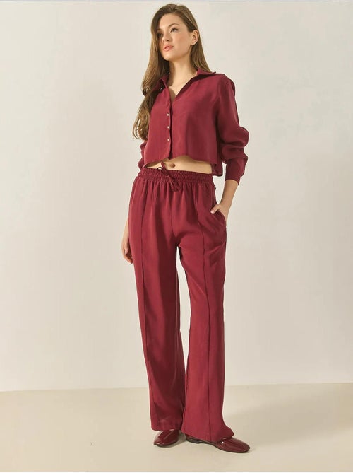 Ensemble deux pièces décontracté en modal avec chemise à col en v et pantalon ample bianco lucci - Kiabi Ensemble deux pièces décontracté en modal avec chemise à col en v et pantalon ample bianco lucci - Kiabi