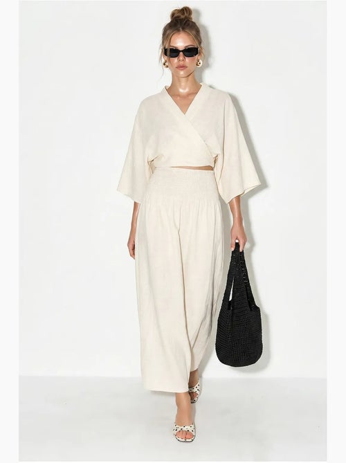 Ensemble deux pièces en coton avec blouse et jupe midi lucci - Kiabi Ensemble deux pièces en coton avec blouse et jupe midi lucci - Kiabi