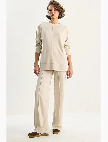 Ensemble deux pièces en maille à taille haute et jambes larges avec détails de finition. Lucci