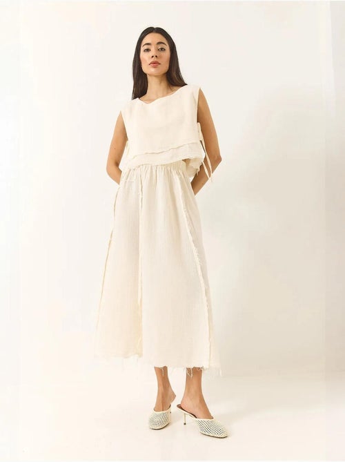 Ensemble deux pièces en mousseline avec jupe taille élastique et lien latéral bianco lucci - Kiabi Ensemble deux pièces en mousseline avec jupe taille élastique et lien latéral bianco lucci - Kiabi