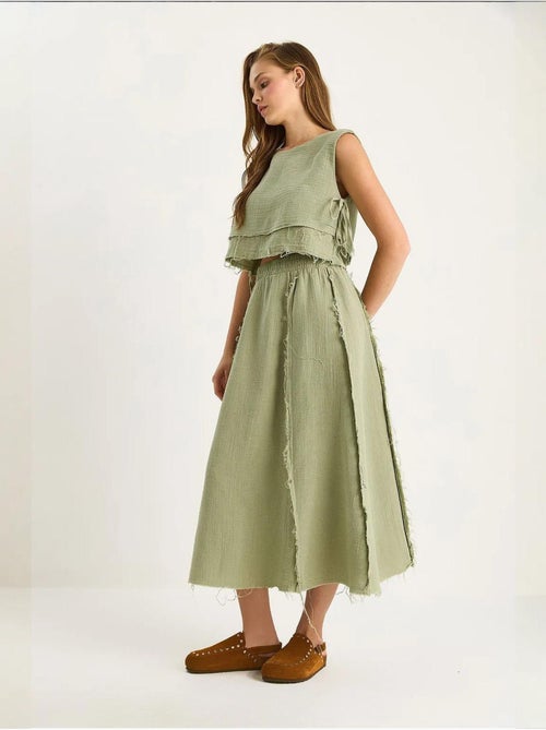 Ensemble deux pièces en mousseline avec jupe taille élastique et lien latéral bianco lucci - Kiabi Ensemble deux pièces en mousseline avec jupe taille élastique et lien latéral bianco lucci - Kiabi