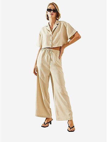 Ensemble deux pièces haut court à col veste et pantalon boutonné à poches lucci