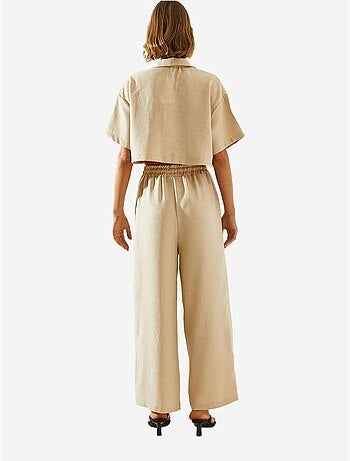 Ensemble deux pièces haut court à col veste et pantalon boutonné à poches lucci