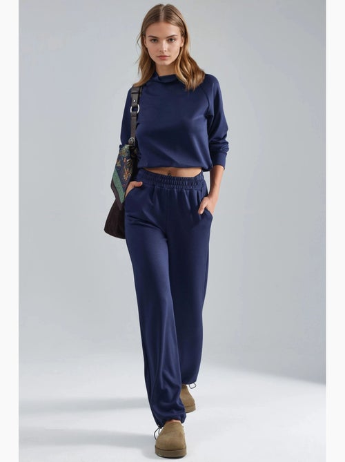 Ensemble deux pièces taille haute à col roulé et jambes larges hiccup - Kiabi Ensemble deux pièces taille haute à col roulé et jambes larges hiccup - Kiabi