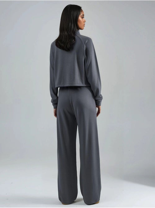 Ensemble deux pièces taille haute à col roulé et jambes larges hiccup - Kiabi Ensemble deux pièces taille haute à col roulé et jambes larges hiccup - Kiabi
